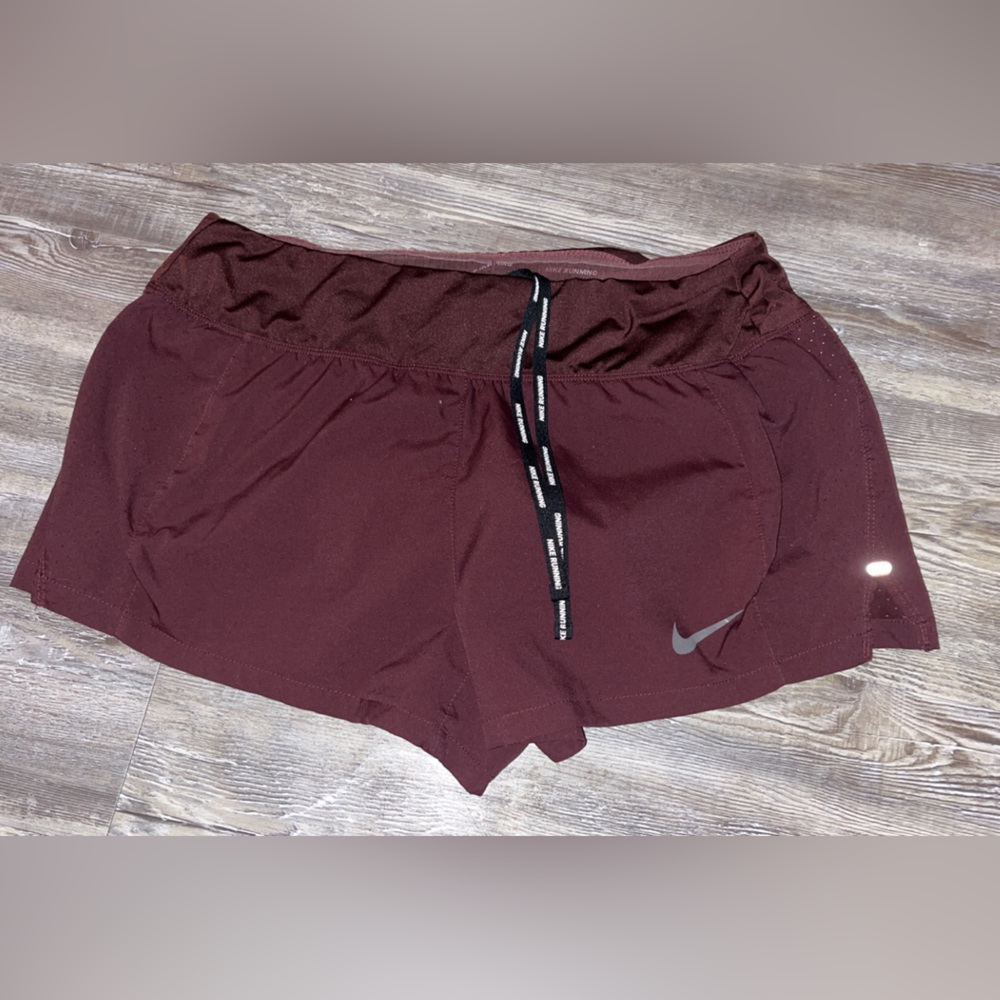 Maroon Nike shorts